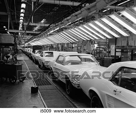 1960S Interior Of Ford Mustang Plant With Nearly Finished Cars On Assembly Line View Large Photo Image Stock Photo - 1960S Interior Of Ford Mustang Plant With Nearly Finished Cars On Assembly Line. Fotosearch