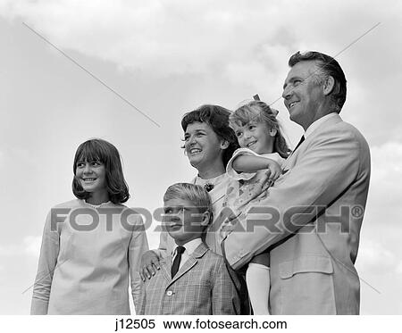 1960S Portrait Family Of Five Outside Looking Off Into Distance View Large Photo Image Stock Photography - 1960S Portrait Family Of Five Outside Looking Off Into Distance. Fotosearch