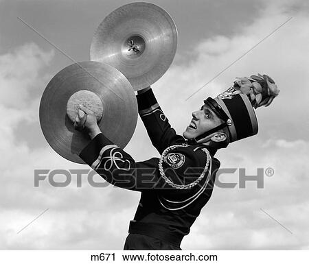 1960S Portrait Of Boy In Band Uniform Playing Instrument Cymbals Outdoors View Large Photo Image Stock Image - 1960S Portrait Of Boy In Band Uniform Playing Instrument Cymbals Outdoors. Fotosearch