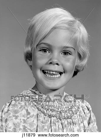 Stock Photo - 1960S Portrait Of Smiling Blond Girl Looking At Camera. Fotosearch