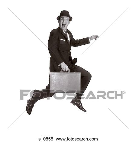 1960S Salesman Leaping In Air Holding Briefcase And Wearing Hat Looking At Camera View Large Photo Image Stock Photo - 1960S Salesman Leaping In Air Holding Briefcase And Wearing Hat Looking At Camera. Fotosearch