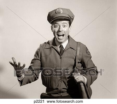 Stock Image - 1960S Studio Portrait Of Happy Man Mailman Postman Looking At Camera. Fotosearch