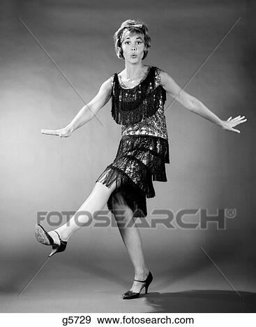 1960S Woman In Flapper Costume Dancing View Large Photo Image Stock Photo - 1960S Woman In Flapper Costume Dancing. Fotosearch