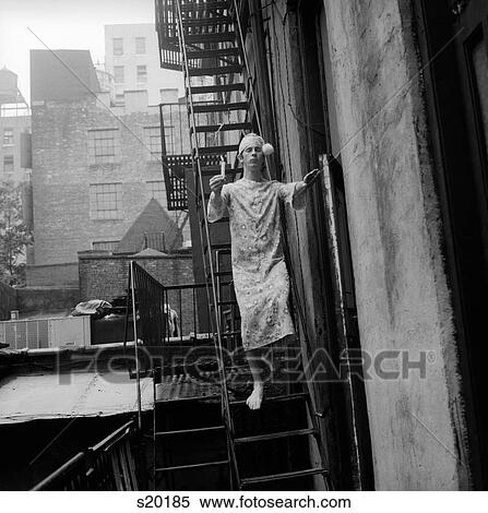 1970S Man In Nightgown And Cap Carrying Candle Sleepwalking Down Fire Escape Outdoor View Large Photo Image Stock Photography - 1970S Man In Nightgown And Cap Carrying Candle Sleepwalking Down Fire Escape Outdoor. Fotosearch