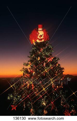Decorated Christmas Tree With Clown On Top View Large Photo Image Stock Image - Decorated Christmas Tree With Clown On Top . Fotosearch