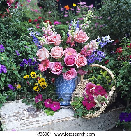 Flower Arrangement With Roses In Garden Setting View Large Photo Image Stock Image - Flower Arrangement With Roses In Garden Setting. Fotosearch
