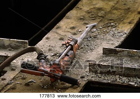 Jack Hammer Laying Idle On Steel Girder View Large Photo Image Stock Image - Jack Hammer Laying Idle On Steel Girder. Fotosearch