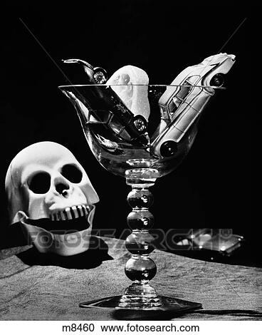 Still Life Concept Of Drunk Driving Toy Cars In Cocktail Glass Beside Plastic Skull Indoor View Large Photo Image Stock Image - Still Life Concept Of Drunk Driving Toy Cars In Cocktail Glass Beside Plastic Skull Indoor. Fotosearch
