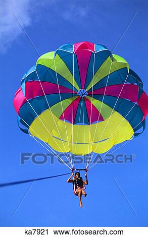 Stock Image - Woman Parasailing . Fotosearch