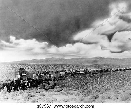 1870S 1880S Montage Of Covered Wagons Crossing The American Plains View Large Photo Image Stock Photo - 1870S 1880S Montage Of Covered Wagons Crossing The American Plains. Fotosearch