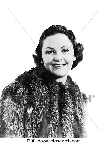 1930S 1940S Portrait Smiling Woman Wearing Fur Coat Looking At Camera View Large Photo Image Stock Image - 1930S 1940S Portrait Smiling Woman Wearing Fur Coat Looking At Camera. Fotosearch