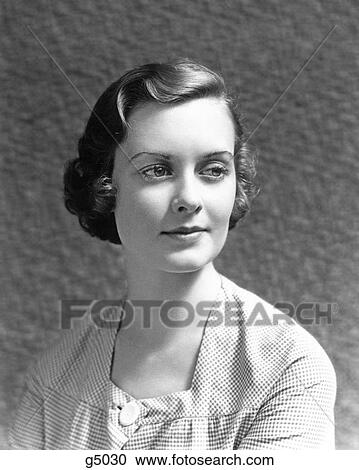 1930S 1940S Portrait Woman Checked Dress With Subtle Mona Lisa Like Smile View Large Photo Image Stock Image - 1930S 1940S Portrait Woman Checked Dress With Subtle Mona Lisa Like Smile . Fotosearch