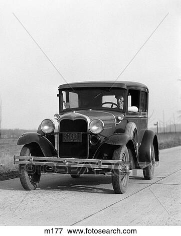 1930S Young Man Driving Ford Model A Car Outdoor View Large Photo Image Stock Photo - 1930S Young Man Driving Ford Model A Car Outdoor. Fotosearch