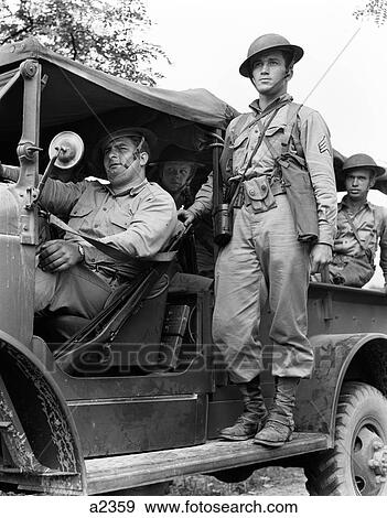 1940S Us Army Soldiers Riding On Military Truck View Large Photo Image Stock Photo - 1940S Us Army Soldiers Riding On Military Truck . Fotosearch
