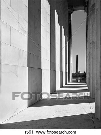 Stock Image - 1950S 1960S Washington Monument Seen From Lincoln Memorial Washington Dc Usa. Fotosearch