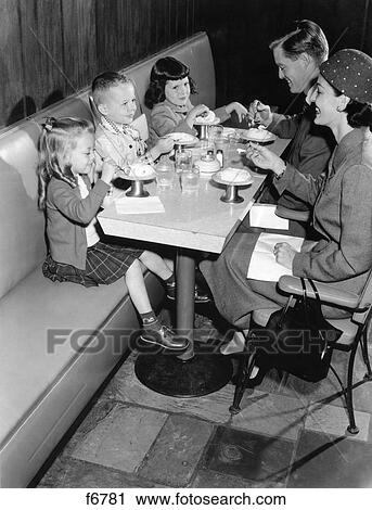 1950S Family Eating Ice Cream At A Diner View Large Photo Image Stock Image - 1950S Family Eating Ice Cream At A Diner. Fotosearch