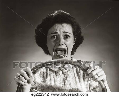 1950S Screaming Frightened Woman Holding On To Steering Wheel Driving Car View Large Photo Image Stock Image - 1950S Screaming Frightened Woman Holding On To Steering Wheel Driving Car . Fotosearch