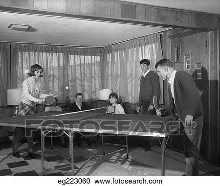 Stock Image - 1950S Teenagers Playing Ping Pong. Fotosearch