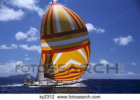 1980S Sailboat With Orange Red And White Spinnaker Sail View Large Photo Image Stock Image - 1980S Sailboat With Orange Red And White Spinnaker Sail. Fotosearch