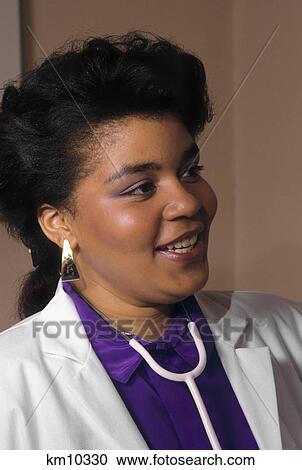 1980S Smiling African American Woman Doctor View Large Photo Image Stock Image - 1980S Smiling African American Woman Doctor. Fotosearch