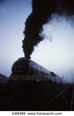 1980S Streamlined Steam Engine In Morning Fog Jacksonville Florida Usa View Large Photo Image Stock Photo - 1980S Streamlined Steam Engine In Morning Fog Jacksonville Florida Usa. Fotosearch
