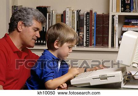 1990S Father And Son With Home Computer View Large Photo Image Stock Image - 1990S Father And Son With Home Computer . Fotosearch