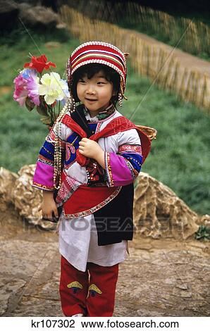 Stock Image - 1990S Sani-Yi Minority Girl Child Yunnan Province China . Fotosearch