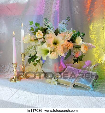 Bible With Bouquet Of White Flowers Candles And Multi Colored Light View Large Photo Image Stock Photograph - Bible With Bouquet Of White Flowers Candles And Multi Colored Light . Fotosearch