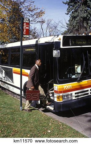Businessman Entering Bus Commuting To Work View Large Photo Image Stock Image - Businessman Entering Bus Commuting To Work . Fotosearch