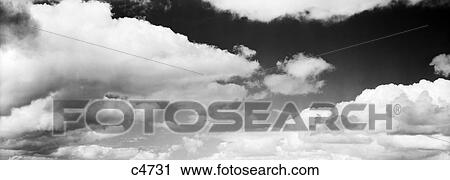 Cumulus And Stratocumulus Clouds In The Sky View Large Photo Image Stock Image - Cumulus And Stratocumulus Clouds In The Sky . Fotosearch