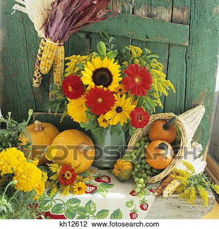 Stock Image - Harvest Still Life With Pumpkins Flowers And Cornucopia. Fotosearch