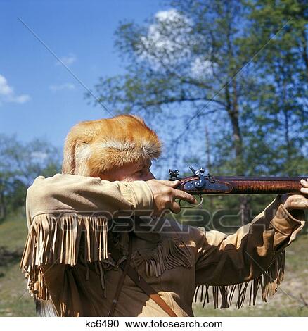 Wilderness Hunter Frontier Rifleman Fringe Jacket Fox Fur Hat Aiming Rifle View Large Photo Image Stock Image - Wilderness Hunter Frontier Rifleman Fringe Jacket Fox Fur Hat Aiming Rifle. Fotosearch