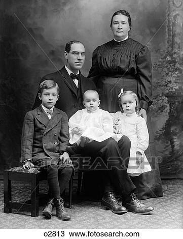 1890S Formal Studio Portrait Of Family Mother Father Three Children Son Daughter Baby View Large Photo Image Stock Image - 1890S Formal Studio Portrait Of Family Mother Father Three Children Son Daughter Baby . Fotosearch
