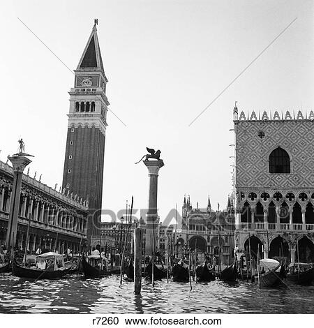 Stock Image - 1920S 1930S Venice Italy Piazza San Marco Campanile Tower And Winged Lion Statue . Fotosearch