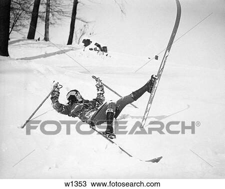 1920S 1930S Woman Wearing Skis Lying Awkwardly In Snow After Having Fallen Down View Large Photo Image Stock Image - 1920S 1930S Woman Wearing Skis Lying Awkwardly In Snow After Having Fallen Down. Fotosearch