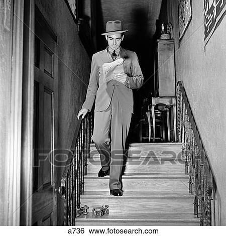 1930S 1940S Accident About To Happen Man Walking Down Stairs Slip On Pair Of Roller Skates View Large Photo Image Stock Photograph - 1930S 1940S Accident About To Happen Man Walking Down Stairs Slip On Pair Of Roller Skates . Fotosearch