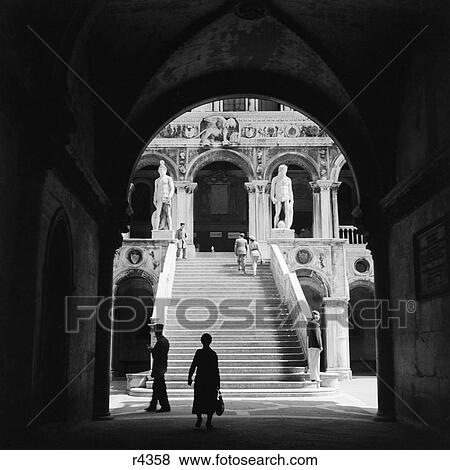1930S 1940S Venice Italy Doges Palace View Through Archway To Staircase With Statues Of Neptune And Mars View Large Photo Image Stock Photo - 1930S 1940S Venice Italy Doges Palace View Through Archway To Staircase With Statues Of Neptune And Mars. Fotosearch