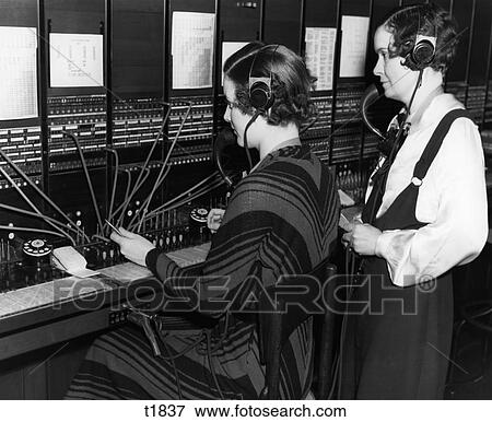 1930S Female Telephone Switchboard Operator And Supervisor View Large Photo Image Stock Photo - 1930S Female Telephone Switchboard Operator And Supervisor. Fotosearch