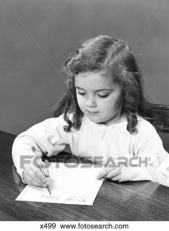 1940S Little Girl With Curly Hair Writing Letter With Pencil And Paper View Large Photo Image Stock Photo - 1940S Little Girl With Curly Hair Writing Letter With Pencil And Paper. Fotosearch