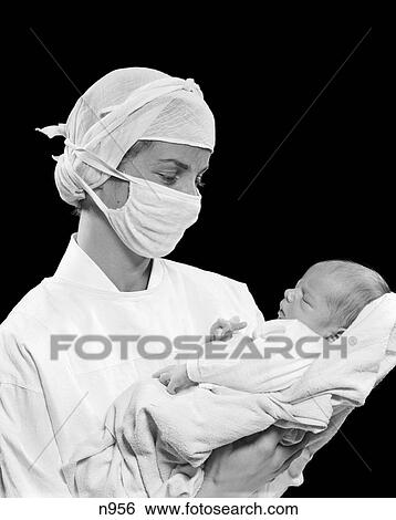 1950S Nurse Surgical Mask Holding Newborn Infant Baby Boy View Large Photo Image Stock Photograph - 1950S Nurse Surgical Mask Holding Newborn Infant Baby Boy. Fotosearch
