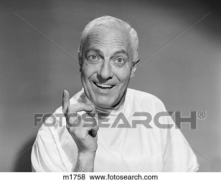 1950S Senior Man Smiling Looking At Camera Gesture With Hand Finger White Coat Doctor Lab Technician Dentist Pharmacist View Large Photo Image Stock Photo - 1950S Senior Man Smiling Looking At Camera Gesture With Hand Finger White Coat Doctor Lab Technician Dentist Pharmacist. Fotosearch
