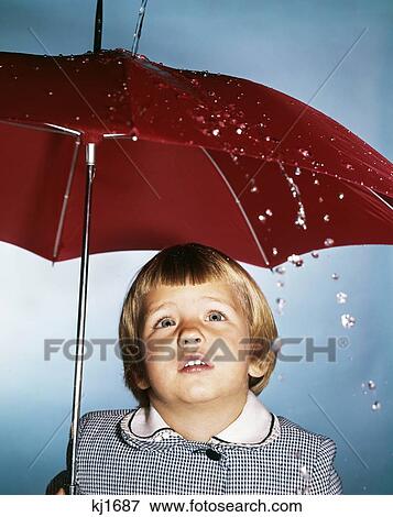 1960S Little Blond Girl Holding Red Umbrella Standing Watching Rain Water Falling View Large Photo Image Stock Photo - 1960S Little Blond Girl Holding Red Umbrella Standing Watching Rain Water Falling. Fotosearch