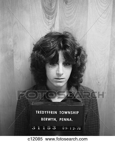 1970S Mug Shot Woman Being Arrested View Large Photo Image Stock Photography - 1970S Mug Shot Woman Being Arrested . Fotosearch