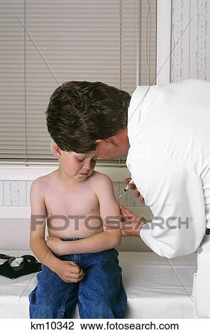 1980S Doctor Giving An Injection To Child  View Large Photo Image Stock Image - 1980S Doctor Giving An Injection To Child . Fotosearch