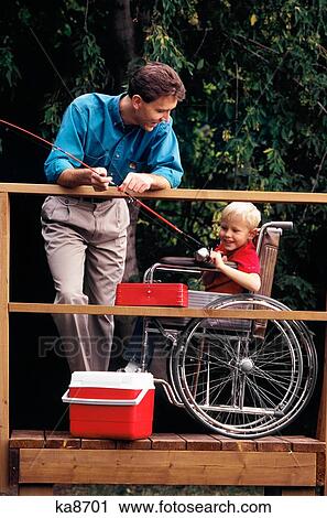 1980S Father And Son In Wheelchair Fishing Together On Dock View Large Photo Image Stock Image - 1980S Father And Son In Wheelchair Fishing Together On Dock. Fotosearch