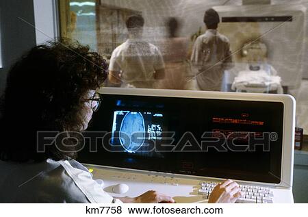 1980S Female Medical Technician Monitoring Console For Nuclear Magnetic Resonance Scanner View Large Photo Image Stock Photo - 1980S Female Medical Technician Monitoring Console For Nuclear Magnetic Resonance Scanner . Fotosearch