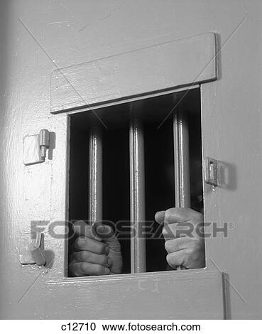 1980S Incarcerated Man Prisoner Hands Gripping Iron Bars On Prison Jail Door View Large Photo Image Stock Image - 1980S Incarcerated Man Prisoner Hands Gripping Iron Bars On Prison Jail Door. Fotosearch