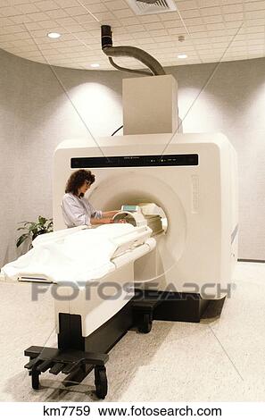 Stock Photo - 1980S Nuclear Magnetic Resonance Imaging Scanner Nurse Technician And Woman Patient. Fotosearch