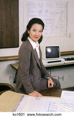 1980S Portrait Of Smiling Asian Business Woman Sitting On Deck Looking At Camera View Large Photo Image Stock Image - 1980S Portrait Of Smiling Asian Business Woman Sitting On Deck Looking At Camera. Fotosearch