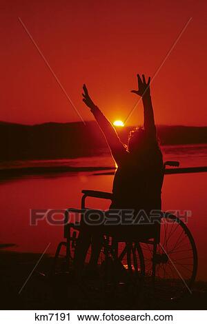 1980S Sunset Sunrise Silhouette Teenage Young Woman In A Wheelchair View Large Photo Image Stock Image - 1980S Sunset Sunrise Silhouette Teenage Young Woman In A Wheelchair . Fotosearch
